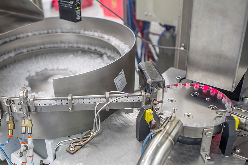 plastic product moving across machine